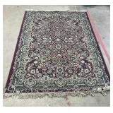 Burgundy and beige area rug 5.3 x 7.7