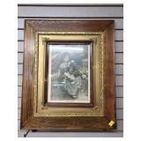 Framed little girl picture with an umbrella in a