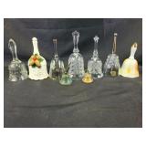 Assortment of glass, metal, and ceramic bells