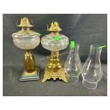 Hurricane lamps with amber glass bases, pair