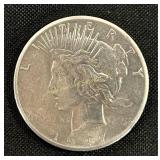1927 Peace dollar, no mint mark, good condition