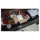 Glass vases, green glass faces, potting soil,