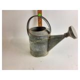 Galvanized watering can- bottom is dented