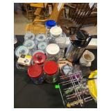 Jars, coffee pot, colorful flatware with display