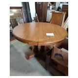 Wooden dining table with turned legs- 48" dia,