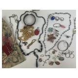 Costume jewelry including bracelets, rings, pins