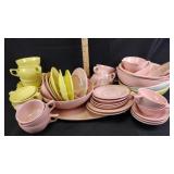 Pink and yellow melamine dinnerware including Mel