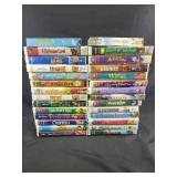 VHS tapes including cinderella, beauty and the