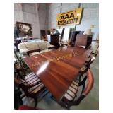 Wooden Dining table with 3 removable leaves, 6