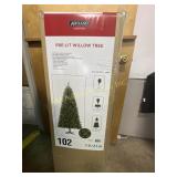 7 ft artificial pre lit Christmas tree, genuine