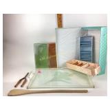 Green and orange hair roller boxes with plastic