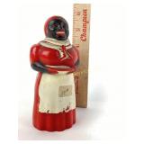 Black Americana syrup container with chipping off