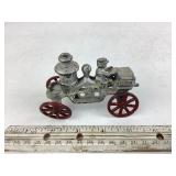 Old cast iron fire pumper engine toy