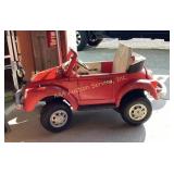 Red Volkswagen kids  power wheel missing