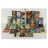 Sci-fi books from the 70s and 80s paperback.