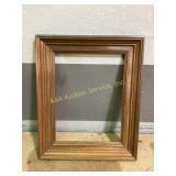 Decorative pictures with ornate golden frames.