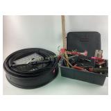 Black rubber landscaping edging. Various tools