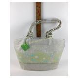 Vera Bradley Promenade tote sitting in a tree