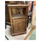 Wooden cabinet 30 inches tall. With door and