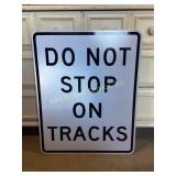 Do Not Stop On Tracks sign. Metal 24 x 30