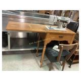 Wooden sewing machine cabinet with New Home