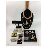 Costume jewelry necklaces, brooches, earrings