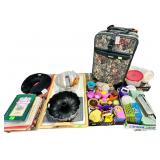 Jaguar small suitcase, several cookbooks,