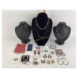 Assorted brooches and earrings