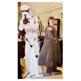 Life-size cardboard display of Harry Potter.