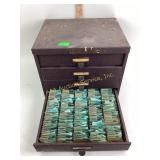 Metal four drawer case containing assorted watch