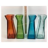 Colored glass vases.