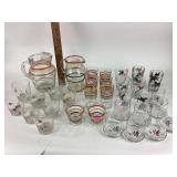 Clear glass, striped drinking pitchers. Clear