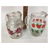 2 MCM clear glass pitchers with orange tulips and