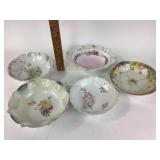 Assorted deep serving dishes, one with crows foot