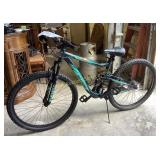 Mongoose black and teal mountain bike, lightly