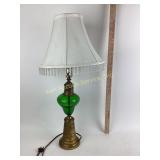 Brass base lamp with green crackle glass, works