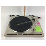 Pioneer PL ï¿½ 400 turntable turns on and spins.