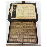 Assorted watch parts within two drawer metal