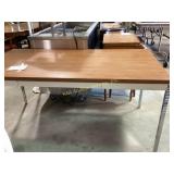 Metal teachers desk, center drawer faux wood top.