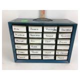 Assorted watch parts in twenty four drawer metal