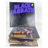 Vinyl record collection including Black Sabbath,