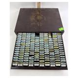 Assorted Bulova parts within metal single drawer