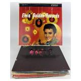 Vinyl record collection including Nat King Cole,