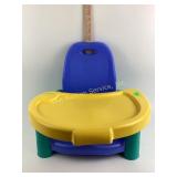 Plastic highchair suitable for baby.