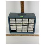 Assorted watch parts within 23 small drawers