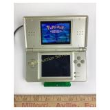 Nintendo DS with Pokï¿½mon Emerald game with