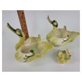 Two large and one small green duck ornaments fair