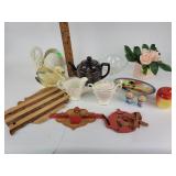 Black porcelain teapot with pattern. Assorted