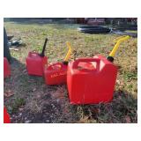 5 1/4 gallon gas cans, [2] 1 gallon gas cans