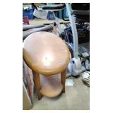 Oval coffee table with hanging shelf, worn and